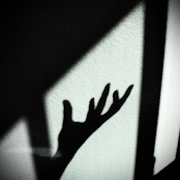Overwhelmed - Gio Silanesu Coaching Calm Mind Collective - feeling overwhelmed, hand shadow