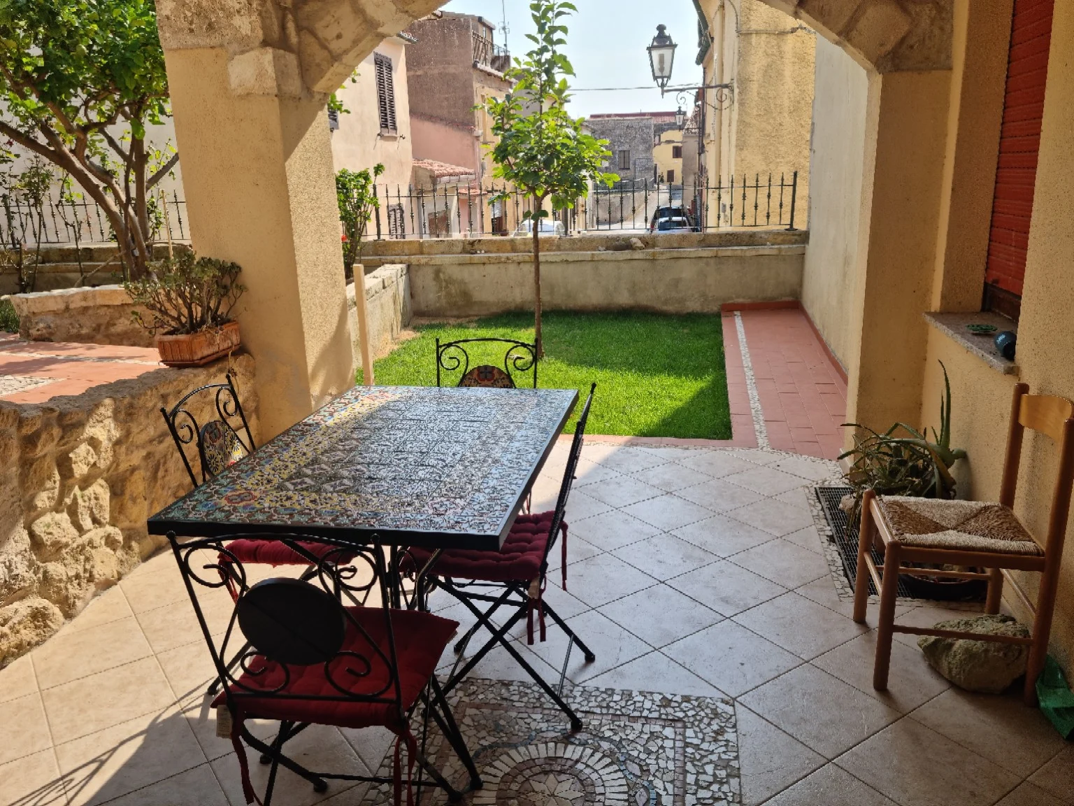 A shaded terrace and tiled table for unhurried mornings